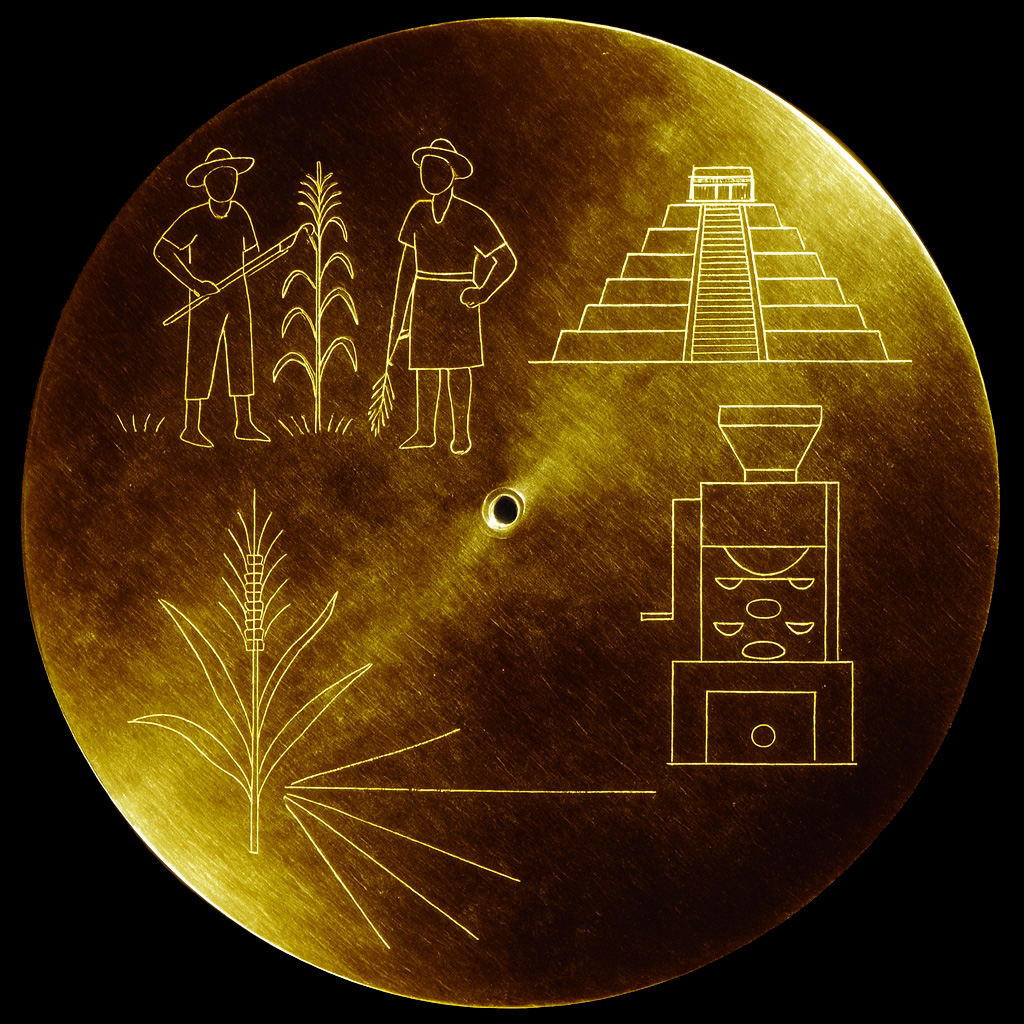 Disco Dorado golden disk with corn, farmers, pyramid, and tortilla machine